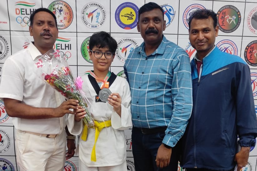 Felicitation of Taekwondo champion.