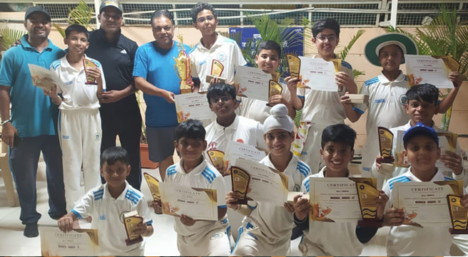 Young representatives of the school with certificates and awards.